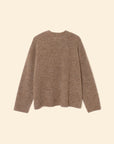 The Julien Sweater by Xirena, a brown long-sleeve crew-neck pullover, is laid flat on a beige background with its back side visible.