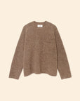 The Julien Sweater by Xirena is a brown, long-sleeve crew neck pullover featuring a subtle chest pocket, displayed flat on a cream-colored background.