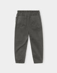 The Xirena Baxter Pant is a loose-fitting, dark gray cotton twill pull-on style with an elastic waistband and two large back pockets, shown flat on a plain white background.