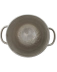 Round cast aluminum bottle cooler with two handles by Creative Co-op on a white background.