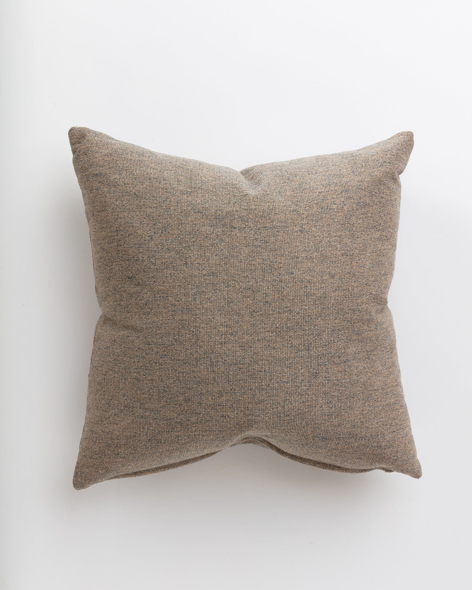 A custom made, square brown Idgie Blue Spruce 24x24" cushion by Gabby with soft, textured fabric and slightly visible seams running along its edges, placed against a plain white background.