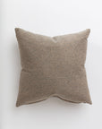 A custom made, square brown Idgie Blue Spruce 24x24" cushion by Gabby with soft, textured fabric and slightly visible seams running along its edges, placed against a plain white background.