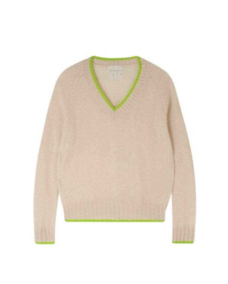 A beige CONTRAST TIP VEE sweater from Jumper 1 2 3 4/CR2 with a neon green trim around the neckline, displayed against a white background in Arizona style.