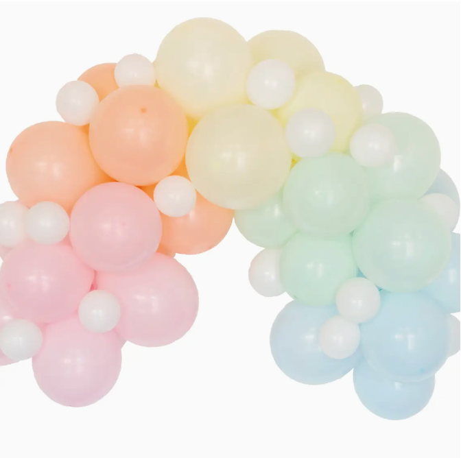 Two balloon bouquets styled like arches, featuring pastel pink, orange, yellow, and blue balloons, with smaller white balloons accentuating the structure using the Faire Balloon Arch Kit Party Dec.