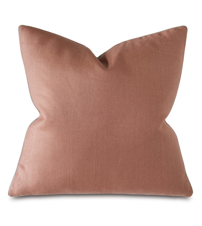 The Castle Linen Rose by Eastern Accents is a square decorative cushion in blush pink with a smooth, soft texture and slightly pointed top corners, shown against a plain white background.