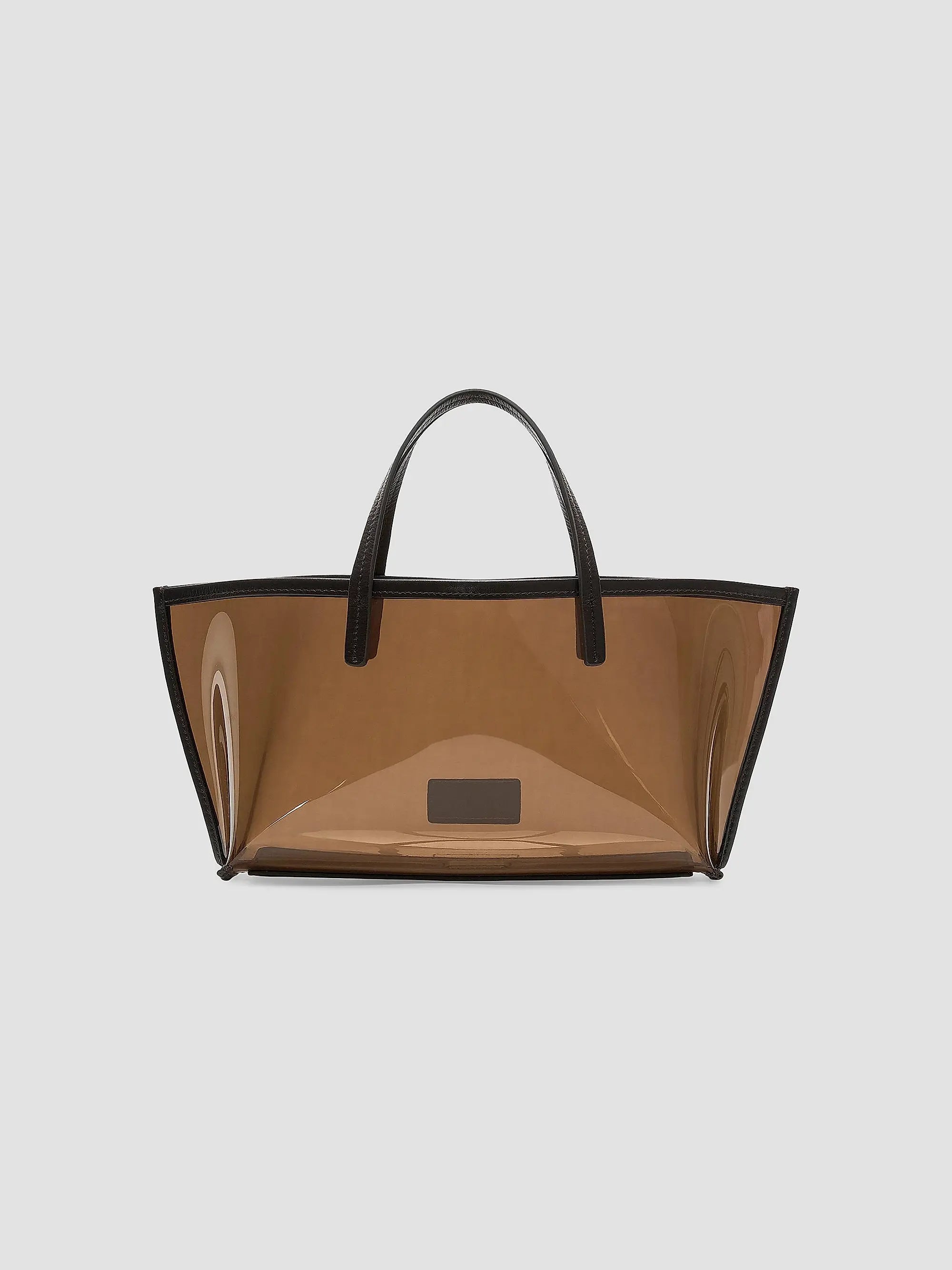 Brown transparent mini tote with black handles and trim, Staud Christos Espresso at Bungalow Furniture &amp; Accessories.