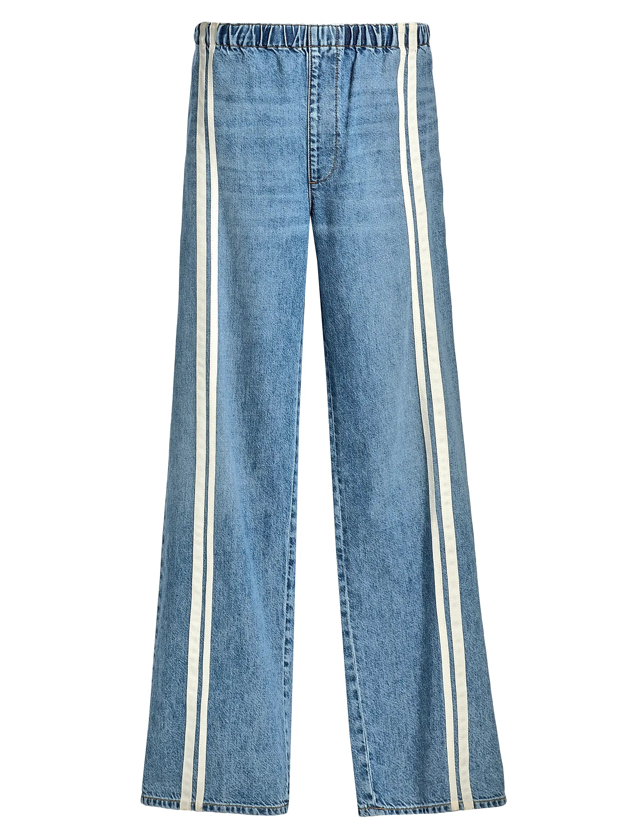 The ftwt logan pull on track by Rag & Bone are blue cotton-blend jeans with a relaxed straight fit, elastic waistband, and two vertical white stripes down the front of each leg.