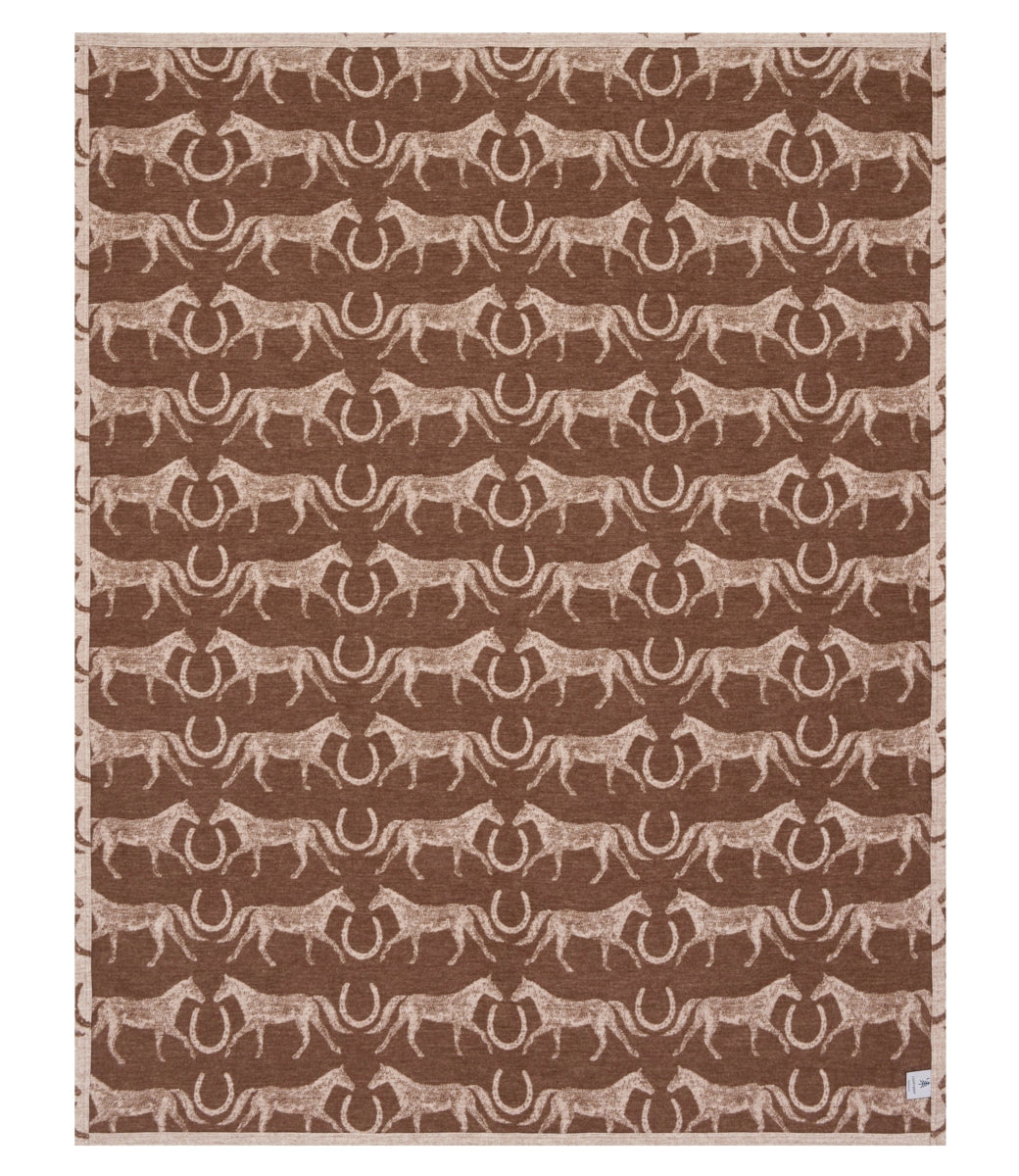 The Hill Country Horses Lightweight Blanket by Faire features brown Chappy textile with beige horses and horseshoes in horizontal rows, making it perfect as a portable, lightweight blanket.