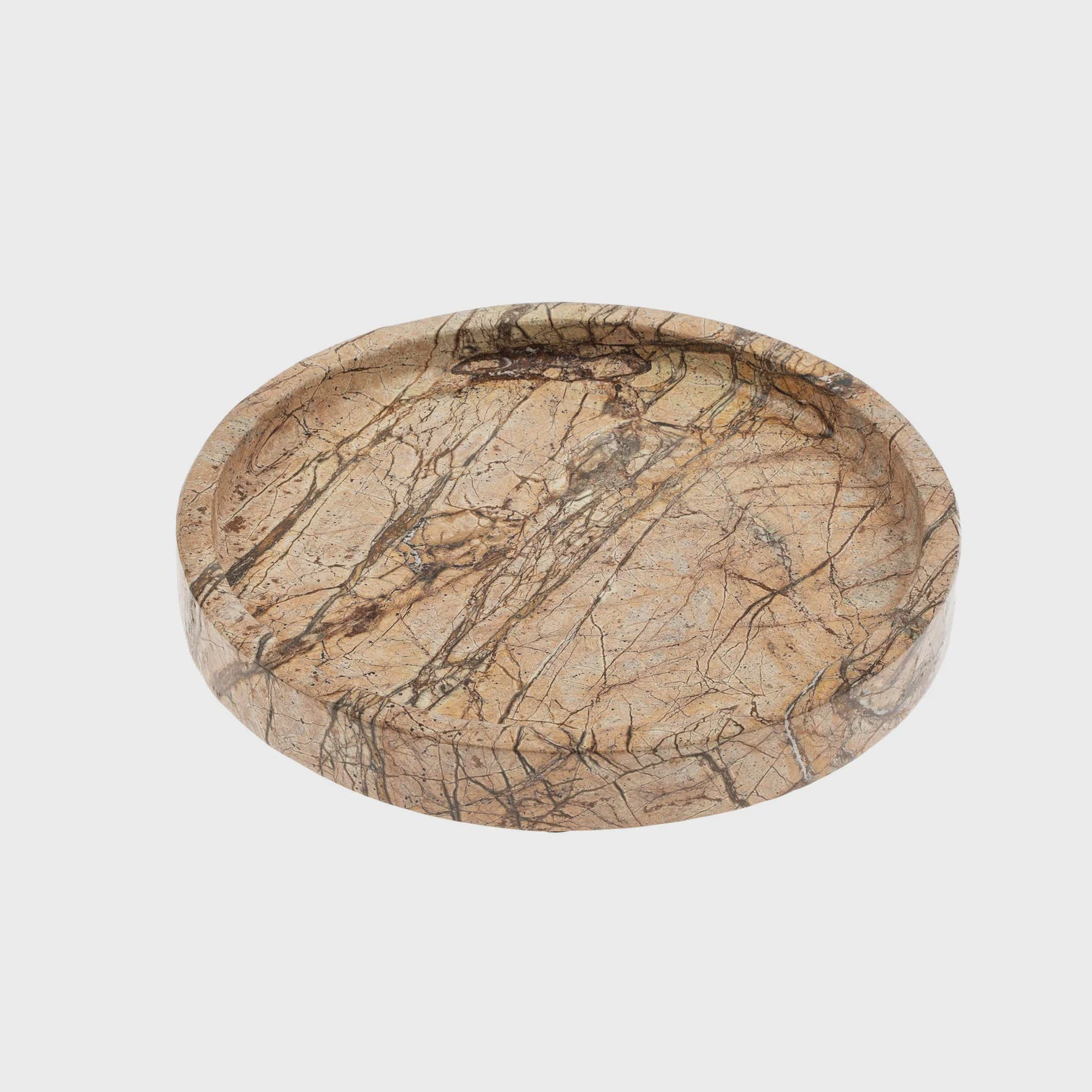 A round tray crafted from luxurious Rainforest Marble with dark veining, meticulously hand-carved by Indaba, set against a plain white background.