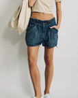 Denimist UTILITY SHORT in beige paired with a crop top and white sneakers, styled for a casual modern look.