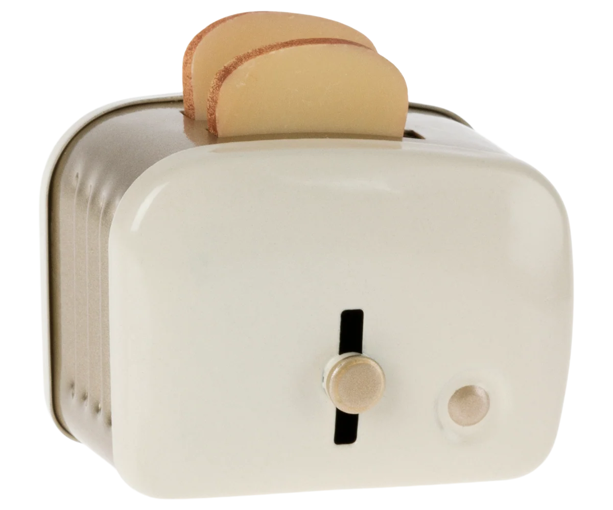 Maileg off-white toaster with two toasted bread slices, front view, by Bungalow Furniture &amp; Accessories.