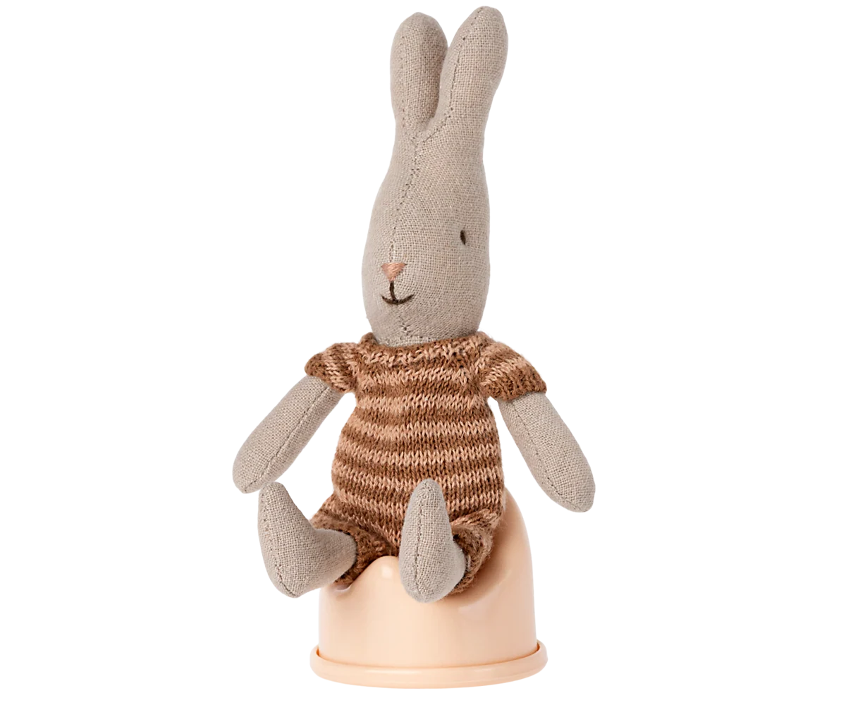 Maileg Micro Potty with a brown-knit stuffed bunny, set against a clean white background, by Maileg.