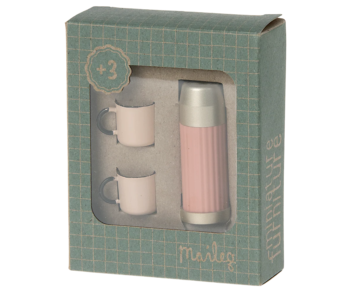 Pink Maileg thermos with two white cups in a green box, styled for hiker mice play, by Bungalow Furniture &amp; Accessories.