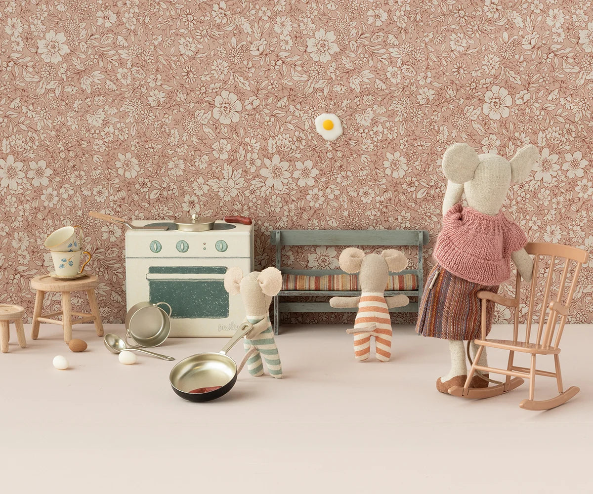 Maileg Cooking Set with three toy mice, kitchen utensils, and whimsical fried egg wall art in playroom setting.