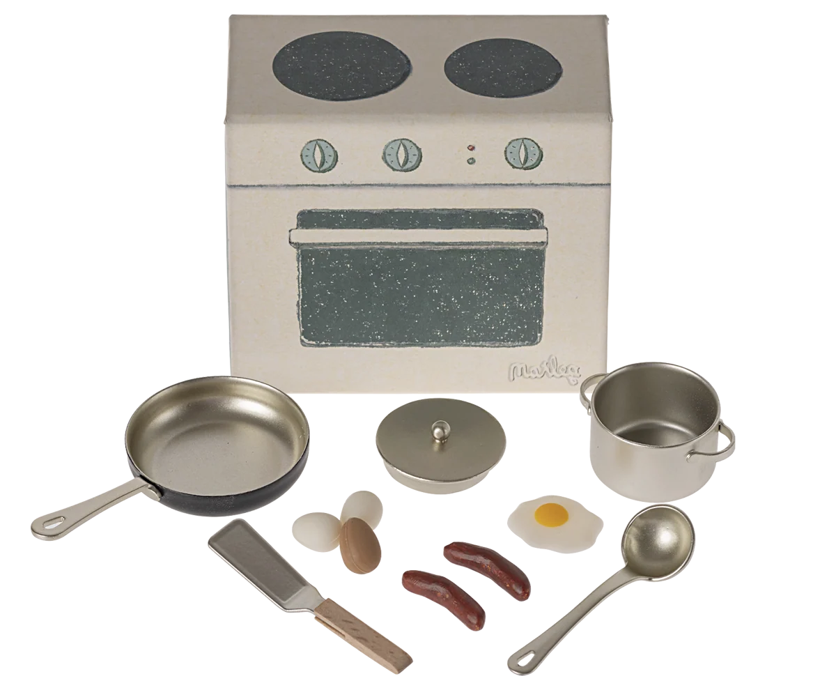 Toy cooking set with stove, pot, pan, utensils, play egg and sausages by Maileg for imaginative play.