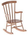 The Maileg Furniture by Maileg is a charming light brown wooden rocking chair with vertical slats and curved rockers, ideal for dollhouse decor or as a seat for your Maileg Mouse, shown on a plain white background.
