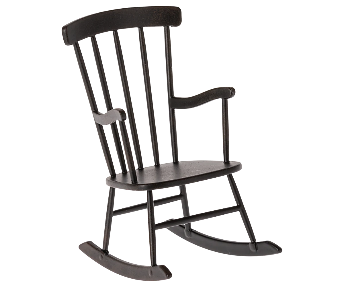 The Maileg Rocking Chair by Maileg, shown against a plain white background, features dark wood, vertical slats on the backrest, curved armrests, and gracefully curved rockers—an ideal piece for mouse furniture or unique living room decor.