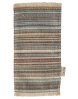The Maileg Furniture is a cute rectangular woven rug by Maileg with blue, brown, beige, and tan stripes, fringed edges, and a fabric label—perfect as dollhouse decor.