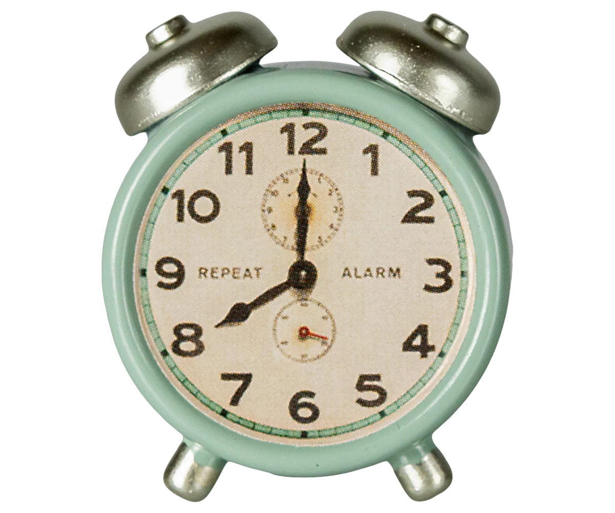 This cute mint green vintage alarm clock from Maileg Furniture by Maileg shows 8:00, with silver bells and &quot;REPEAT&quot; and &quot;ALARM&quot; printed on the face—perfect for dollhouses or a Maileg Mouse setup.