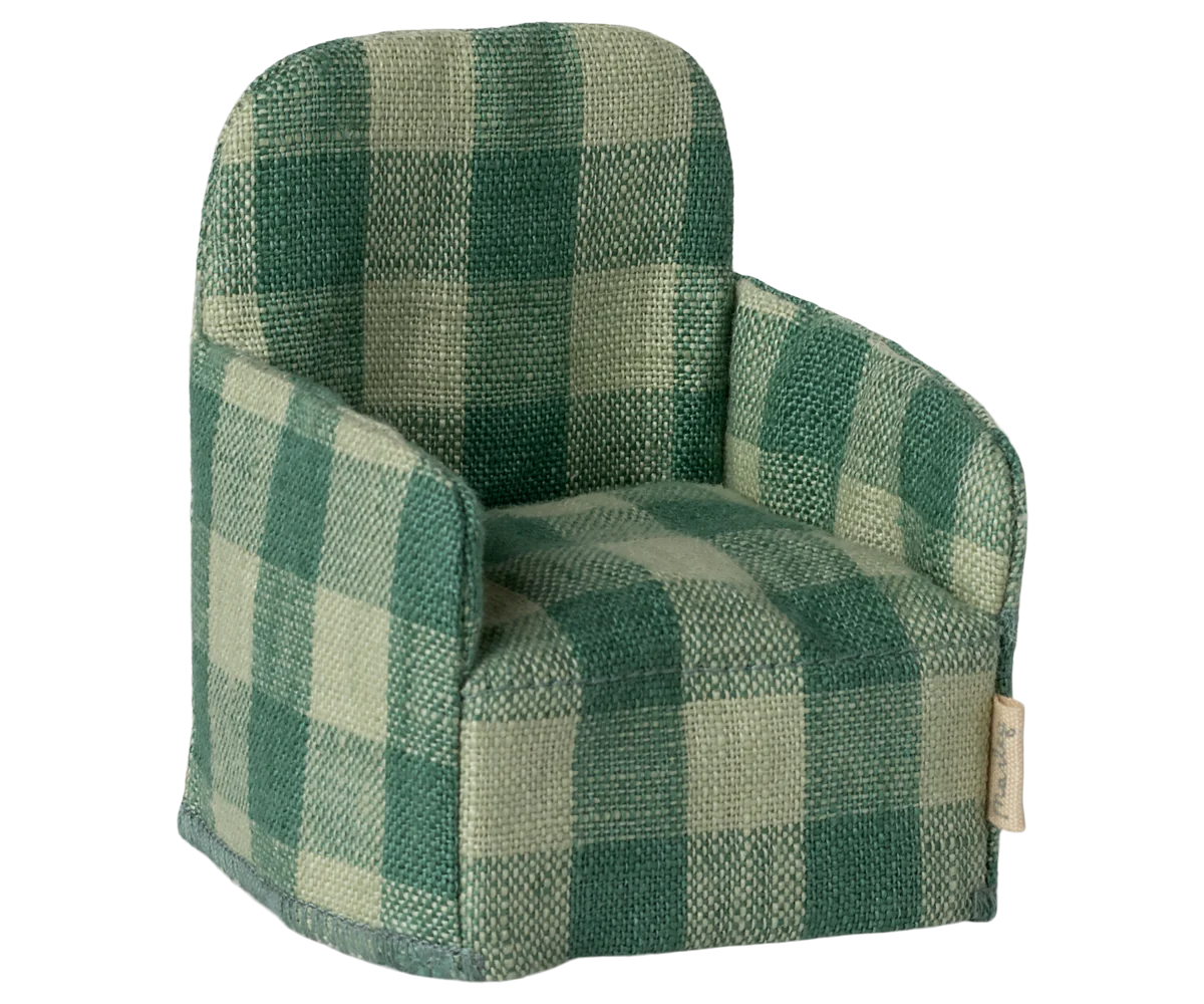 The Maileg Furniture armchair by Maileg features green and light beige plaid upholstery with rounded arms and backrest, ideal as dollhouse furniture or for a Maileg Mouse.