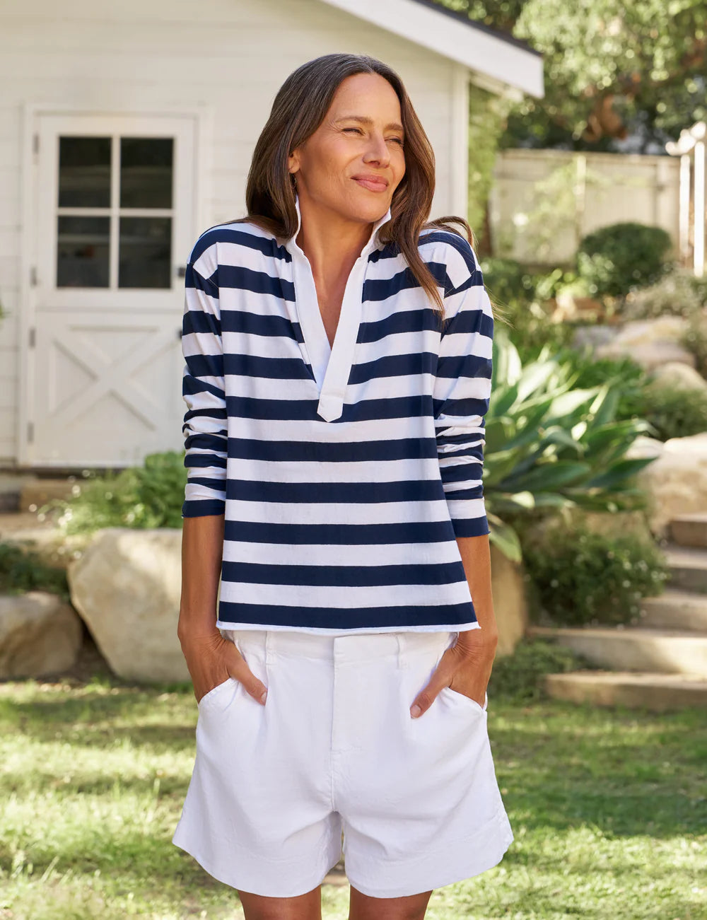 Frank &amp; Eileen Patrick Henley Jersey in Nautical Stripe worn outdoors, styled with a green garden backdrop.
