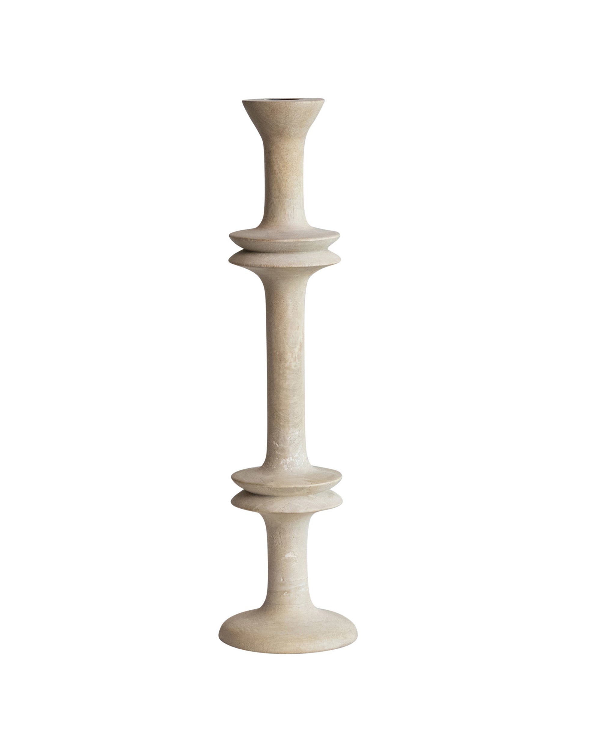The 14 1/2" Mango Wood Taper by Bloomingville is a tall, beige candle holder with two circular accents and wide rounded base and top—ideal for rustic farmhouse decor, shown here against a white background.