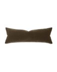 The Trillium Mohar 13X36 pillow by Eastern Accents, featuring a long, rectangular design in brown velvet and a plush pillow insert, is displayed against a white background. The pillow's smooth surface is complemented by slightly tapered ends.