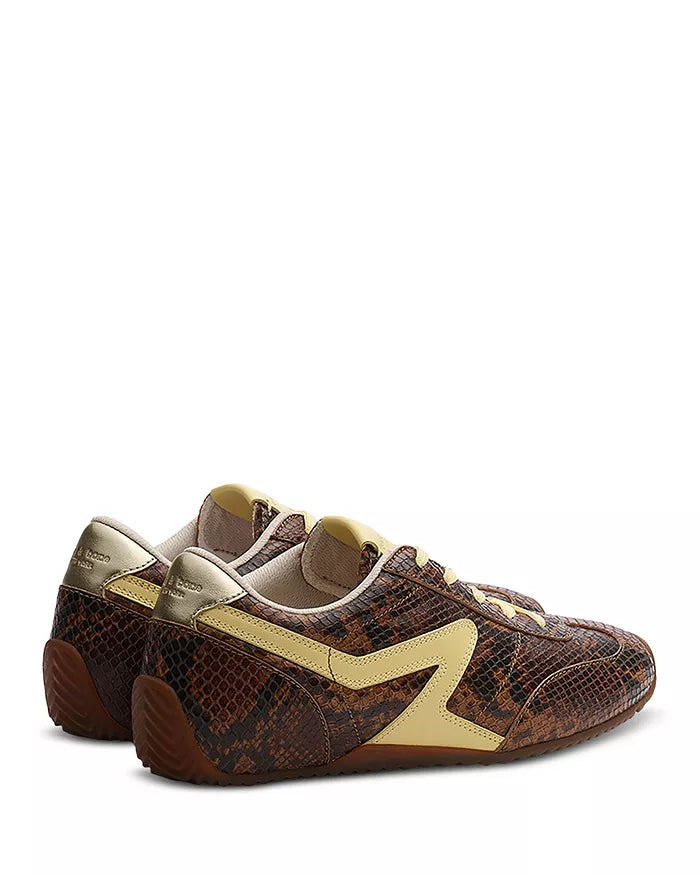 The Rag & Bone retro runner slim ultra features a brown and black snake-print leather upper, tan accents, rubber soles, and a wavy tan side design. Shown angled to highlight the outer sides and backs.