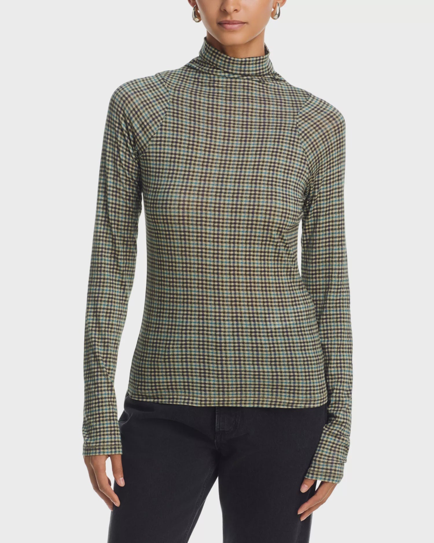 Rag &amp; Bone black shaw paneled turtleneck sweater and pants, modern styling against a plain white background.