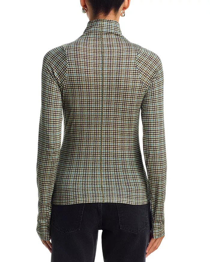 Black Rag &amp; Bone long sleeve paneled turtleneck with black jeans, back view, against white background.