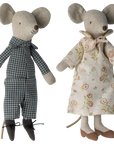 Maileg Grandma & Grandpa Mice by Maileg feature Grandma in a cream floral dress and Grandpa in a blue plaid outfit, both with stitched faces and big ears—perfect for tucking into a matchbox bed.