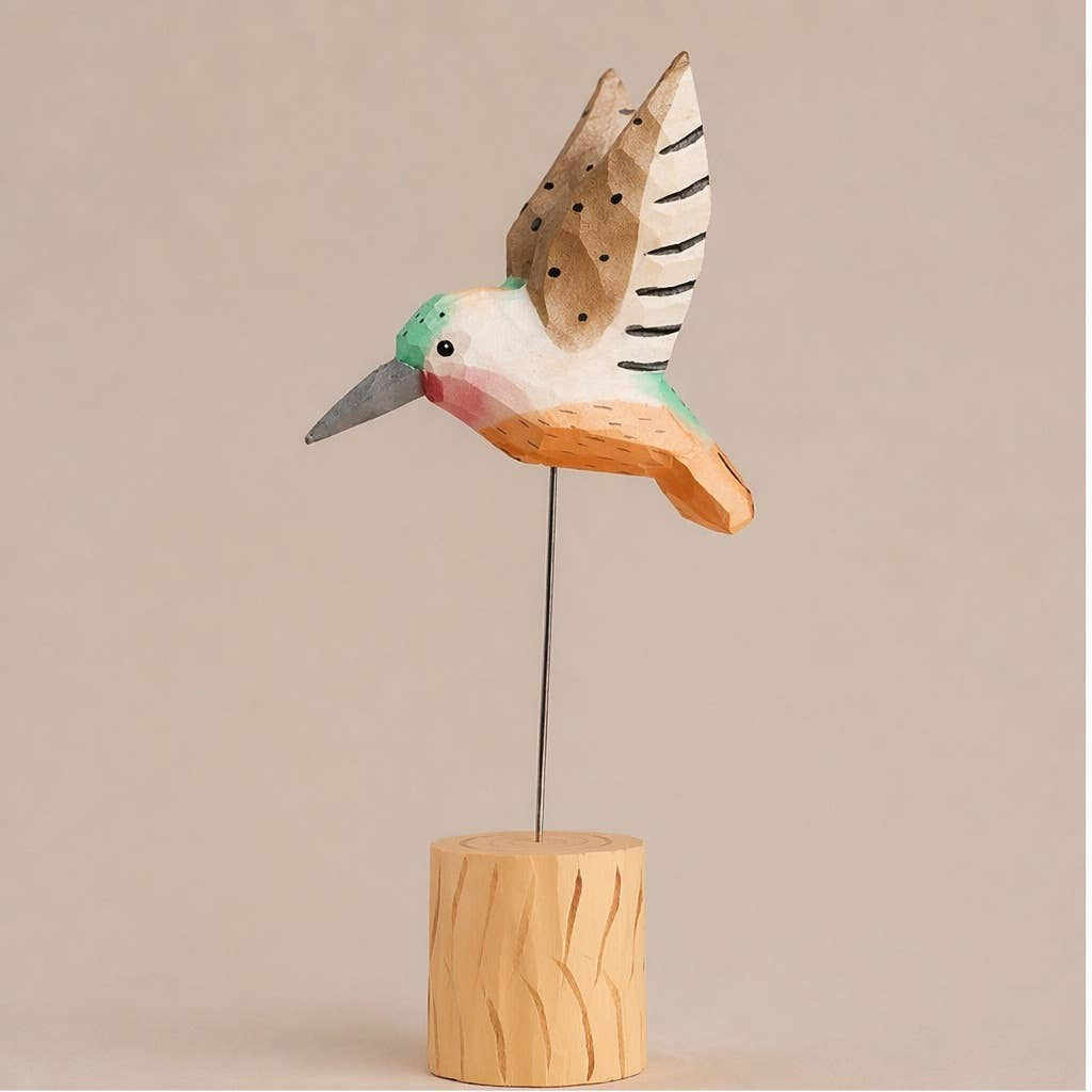 Brown hand-painted hummingbird figurine by Faire, carved wood on wire base, displayed against a plain background.