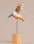 Brown hand-painted hummingbird figurine by Faire, carved wood on wire base, displayed against a plain background.