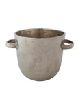 Bottle cooler with textured surface and side handles by Creative Co-op, displayed on a white background.