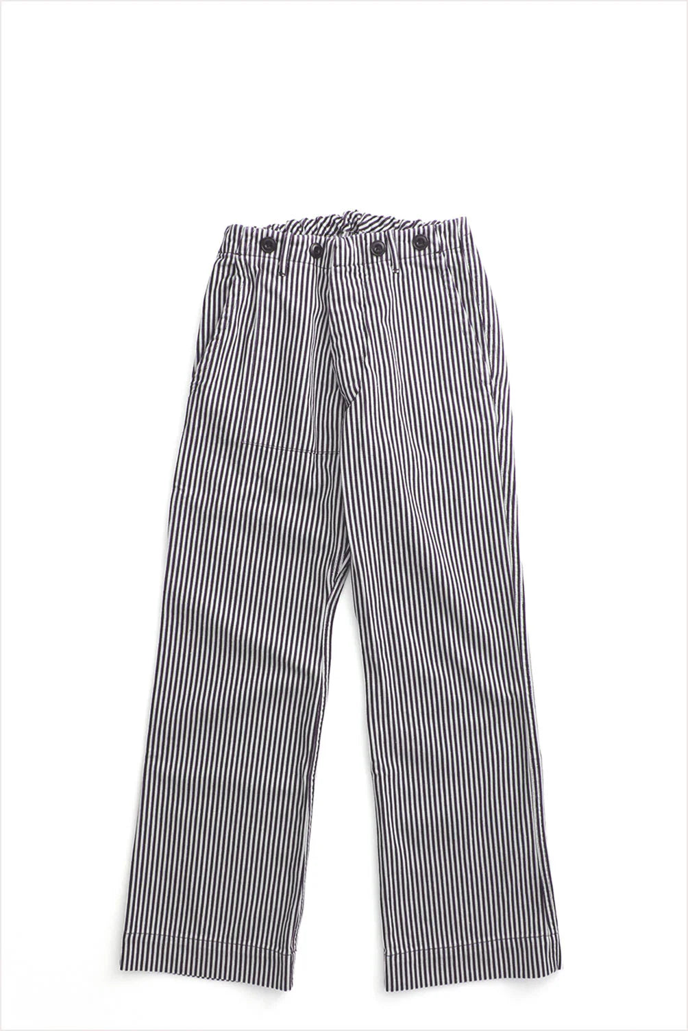 The Indigo Stripe Sailor Pant by Free City (sparrow, LLC) features loose-fitting, straight-leg unisex design with vertical black and white stripes, inspired by classic French sailor pants and shown laid flat on a white background.