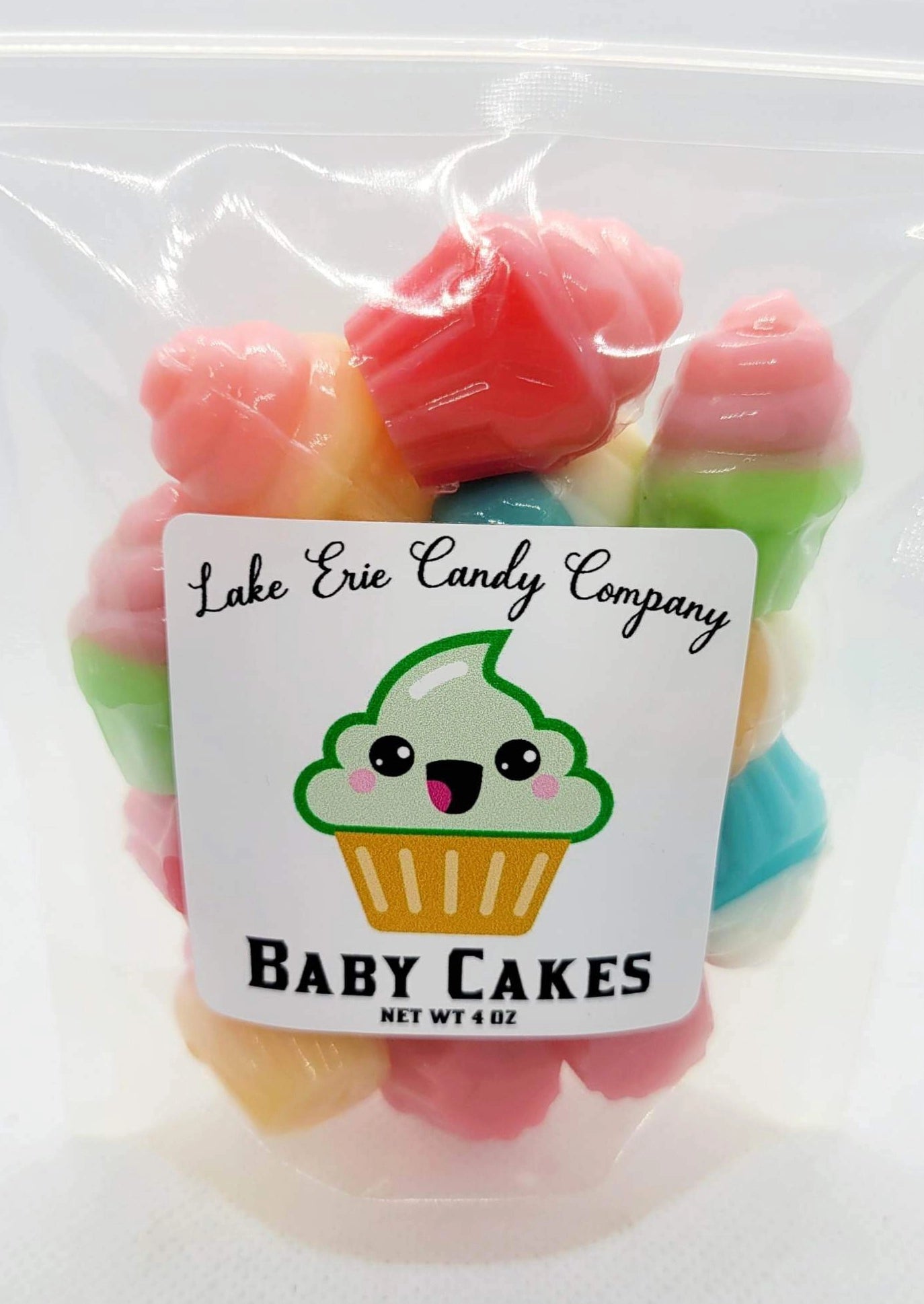 A clear bag of colorful cupcake-shaped candies labeled "Lake Erie Valentine Candy" by Faire, featuring a cute cupcake illustration—perfect for Valentine's Day or to add to your Valentines candy assortment.