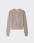 The White + Warren Fine Cotton Blend Henley is a light beige sweater with long sleeves, a round neckline, partial button-front, and ribbed texture. A versatile staple, it's shown on a plain white background.