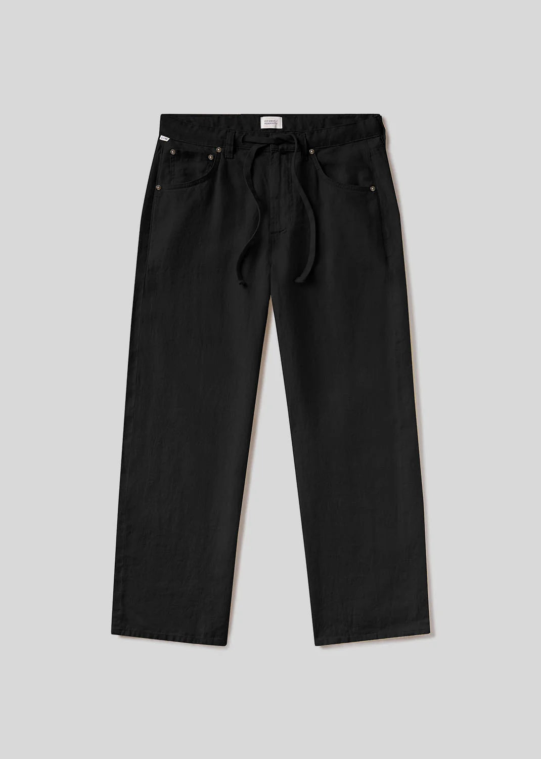 The brynn drawstring trouser in linen by Citizens Of Humanity/AGOLDE features a relaxed fit, drawstring waist, elastic band, and four pockets, shown laid flat on a plain light gray background.