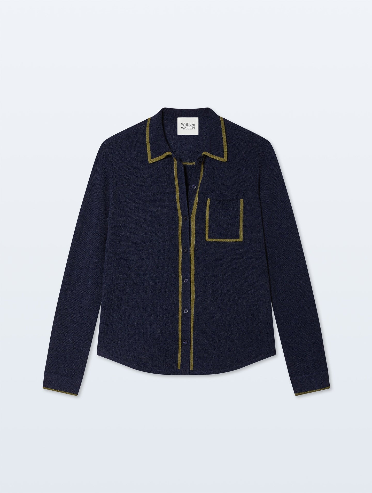 The Cashmere Tipped Button Shirt by White + Warren features a navy menswear design with olive trim on the collar, pocket, placket, and cuffs, plus a single chest pocket and curved hem for timeless style.