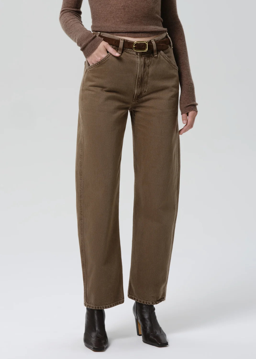 Miro Full Length Deck Pant by Citizens Of Humanity/AGOLDE with matching sweater, belt, and black ankle boots.