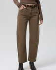 Miro Full Length Deck Pant by Citizens Of Humanity/AGOLDE with matching sweater, belt, and black ankle boots.