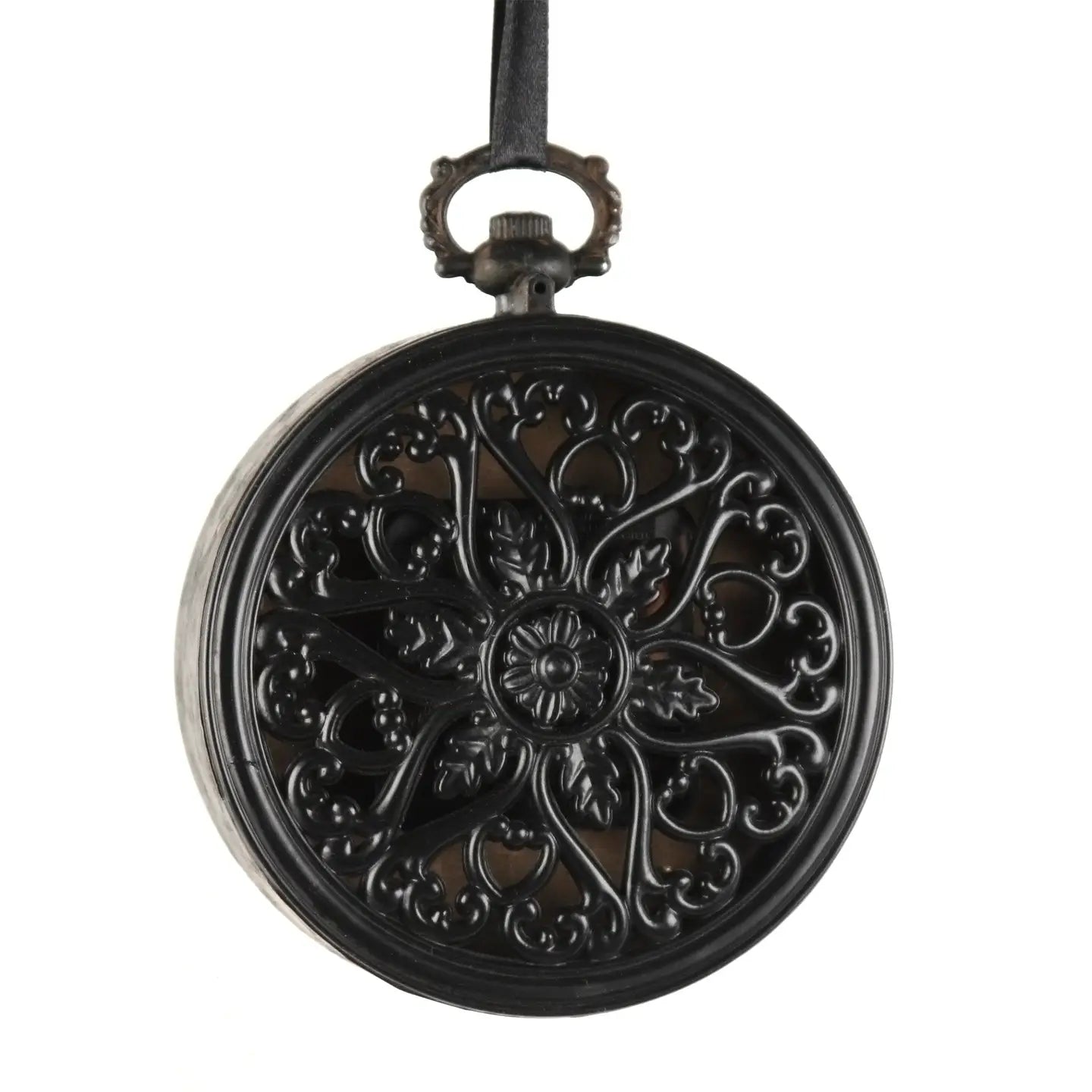The Zentique Myrtle Iron Clock is round and black with an antique look, featuring an ornate floral and heart-patterned metal cover, a top handle, and a black carrying strap.