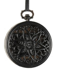 The Zentique Myrtle Iron Clock is round and black with an antique look, featuring an ornate floral and heart-patterned metal cover, a top handle, and a black carrying strap.