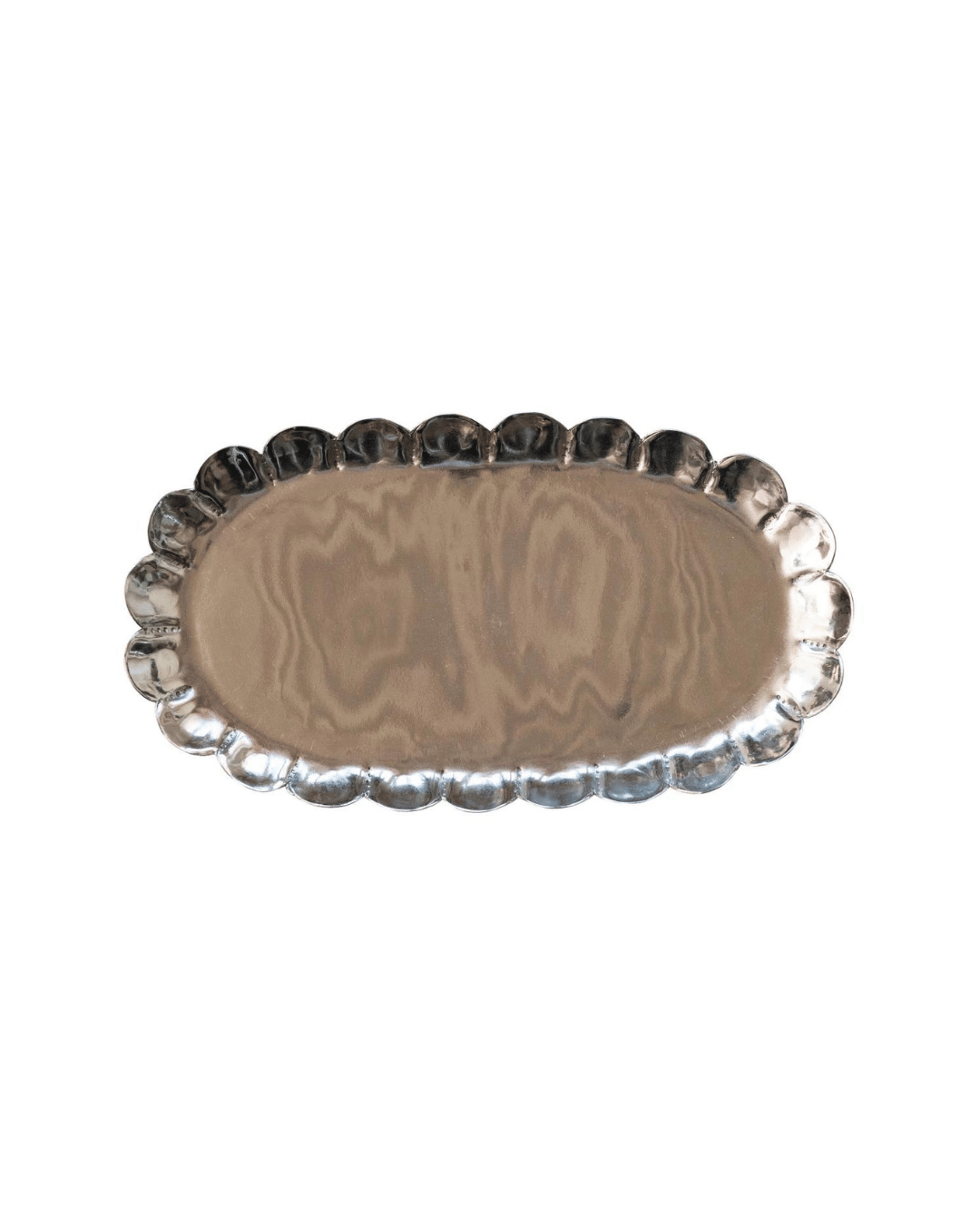 The Scalloped Tray Silver by Creative Co-op is an oval-shaped decorative metal tray featuring a scalloped edge. Its slightly reflective silver finish showcases subtle, wavy patterns across the surface. The tray is empty and set against a plain white background.