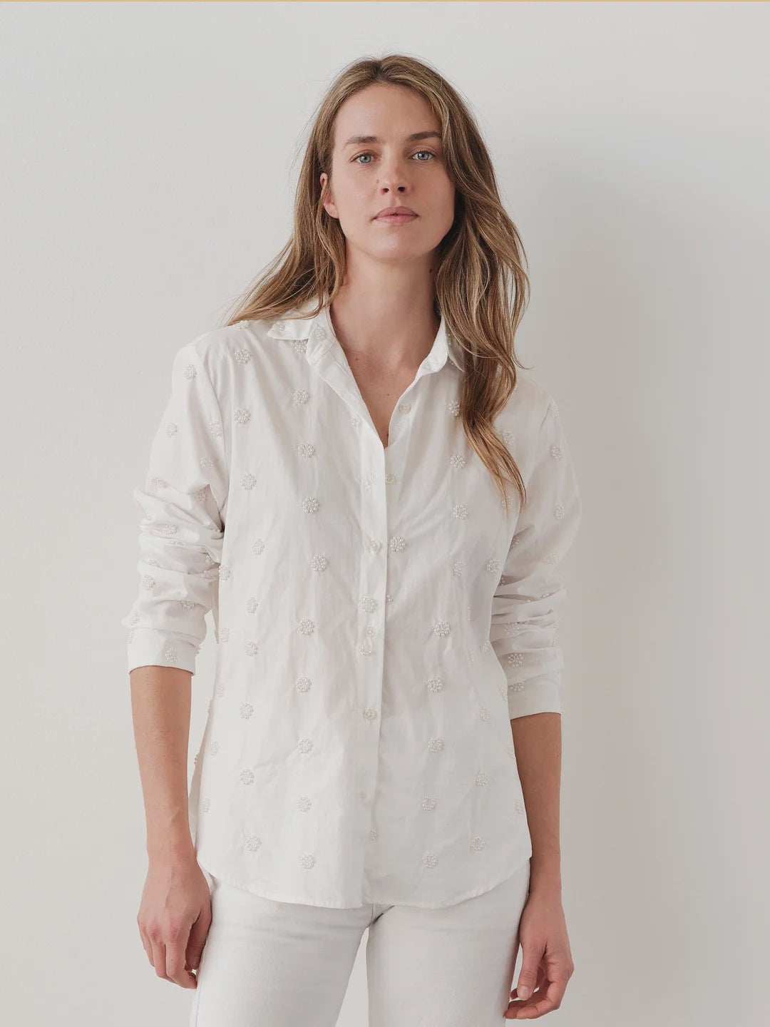 White button-up shirt by Cissa, classic silhouette paired with pants, photographed against a simple background.