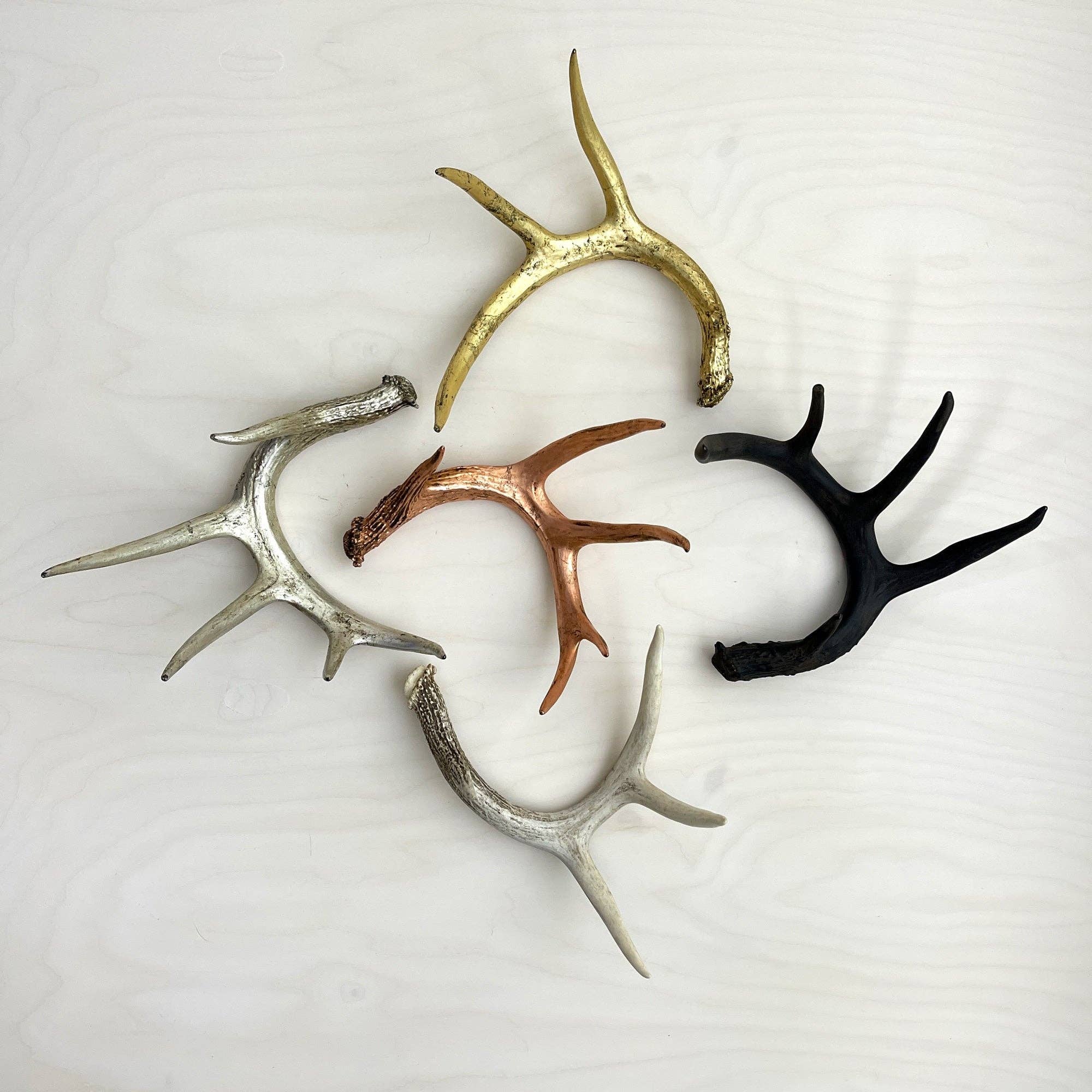 Gilded antler accents in gold, black, copper, silver and natural hues by Owen Mortensen for Bungalow Furniture.