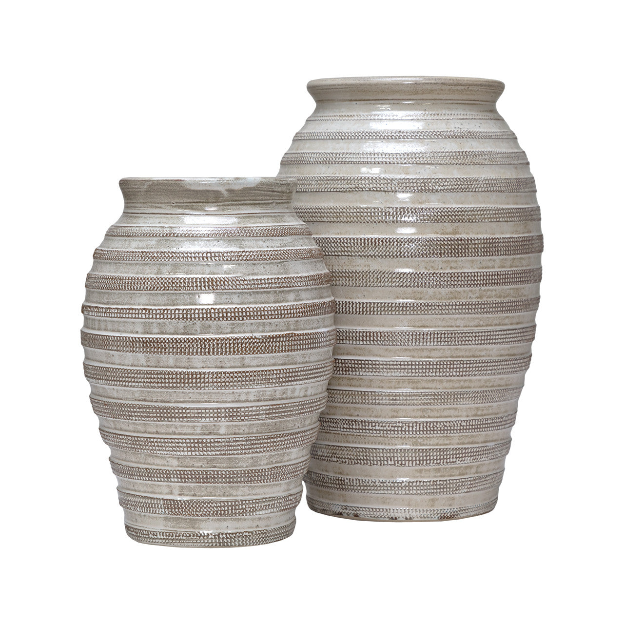 The Import Collection’s Jaxton Short Vases feature a ribbed beige and light brown striped design, showcasing exquisite ceramic craftsmanship and a textured, handcrafted look—perfectly styled side by side.