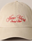 This beige cap from Faire features bold red "New York Social Club" text embroidery on the front and comes with an adjustable strap for a perfect fit.