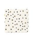 The MME Napkin by Faire is a square napkin showcasing a design of grey and black stars on a white background, complete with scalloped edges.