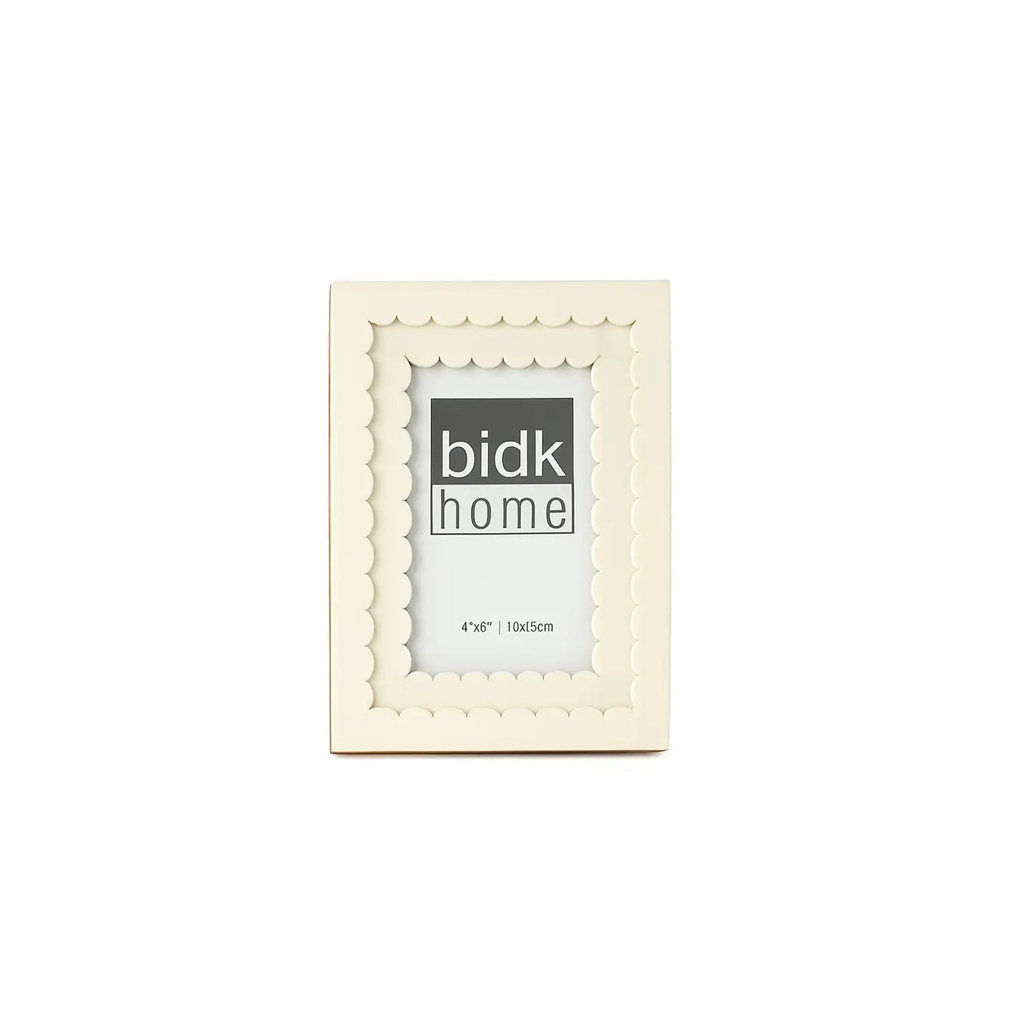 The BIDK Home 4x6 Floral Resin Frame features a cream color and scalloped inner border, making it perfect for elegant decor. It displays a &quot;bidk home&quot; placeholder image with the size &quot;4 x 6 in | 10 x 15 cm&quot; on a plain white background.